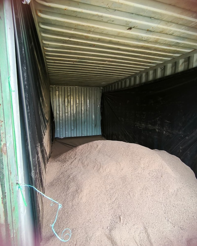 Bulk PKE in a Container — Palm Kernel Expeller, East Kalimantan
